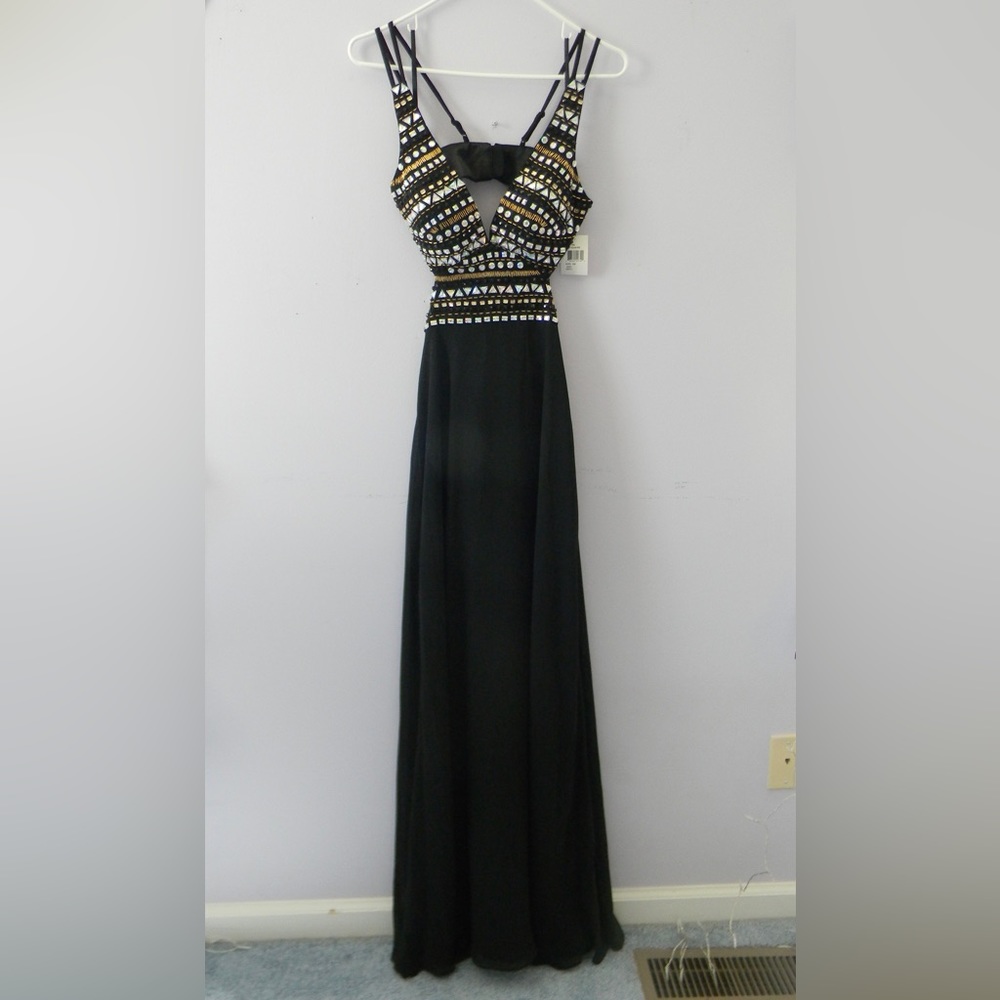 Beautiful black and gold prom dress with bejeweled top and open back Size 3/4